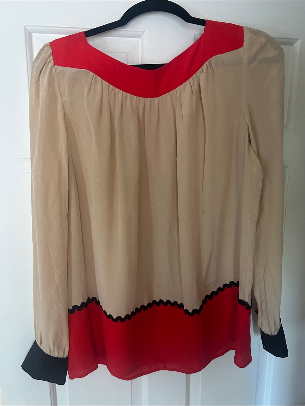 Beige and Red Long-Sleeve Blouse with Black Trim